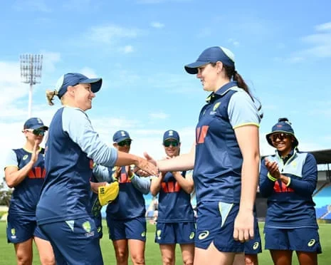 Alyssa Healy of Australia presents Lucy Hamilton of Australia with her first cap