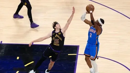Shai Gilgeous-Alexander #2 of the Oklahoma City Thunder shoots over Austin Reaves #15 of the Los Angeles Lakers during an NBA Playoffs basketball game, Monday May 11, 2026 in Los Angeles, Calif.