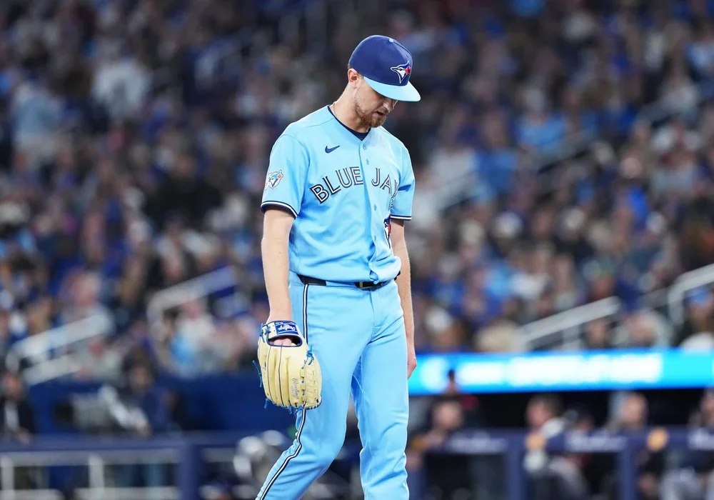 Eric Lauer (56) walks towards the dugout against the Minnesota Twins during the third inning at Rogers Centre.